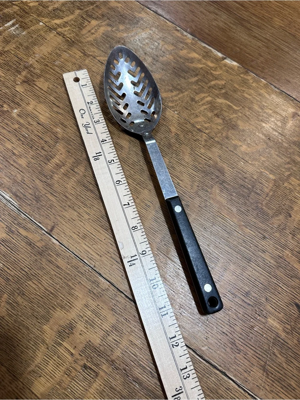 Ekco vintage Stainless Steel Slotted Serving Spoon with Black Handle